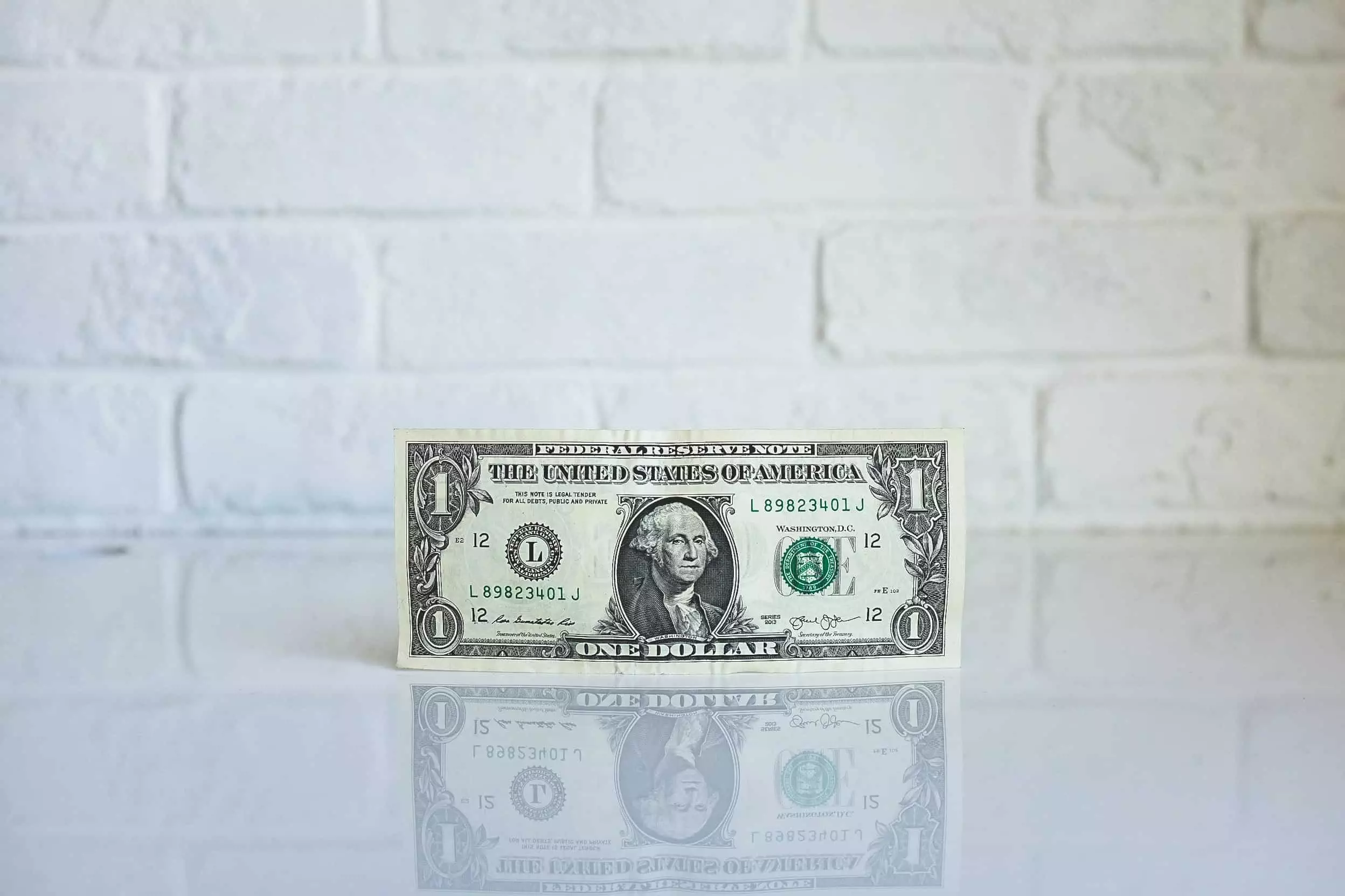 dollar bill on counter top