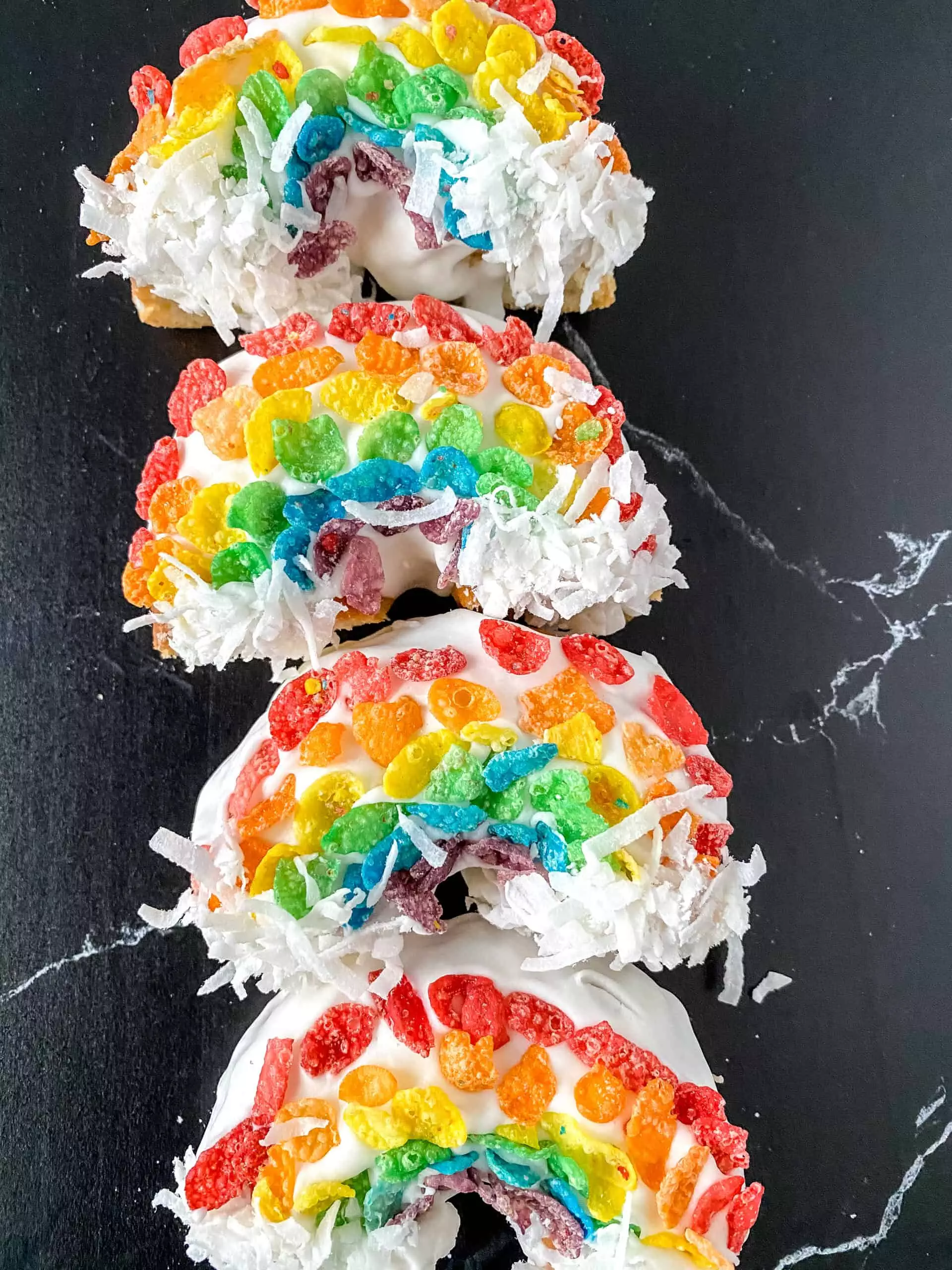 Rainbow donuts lined up