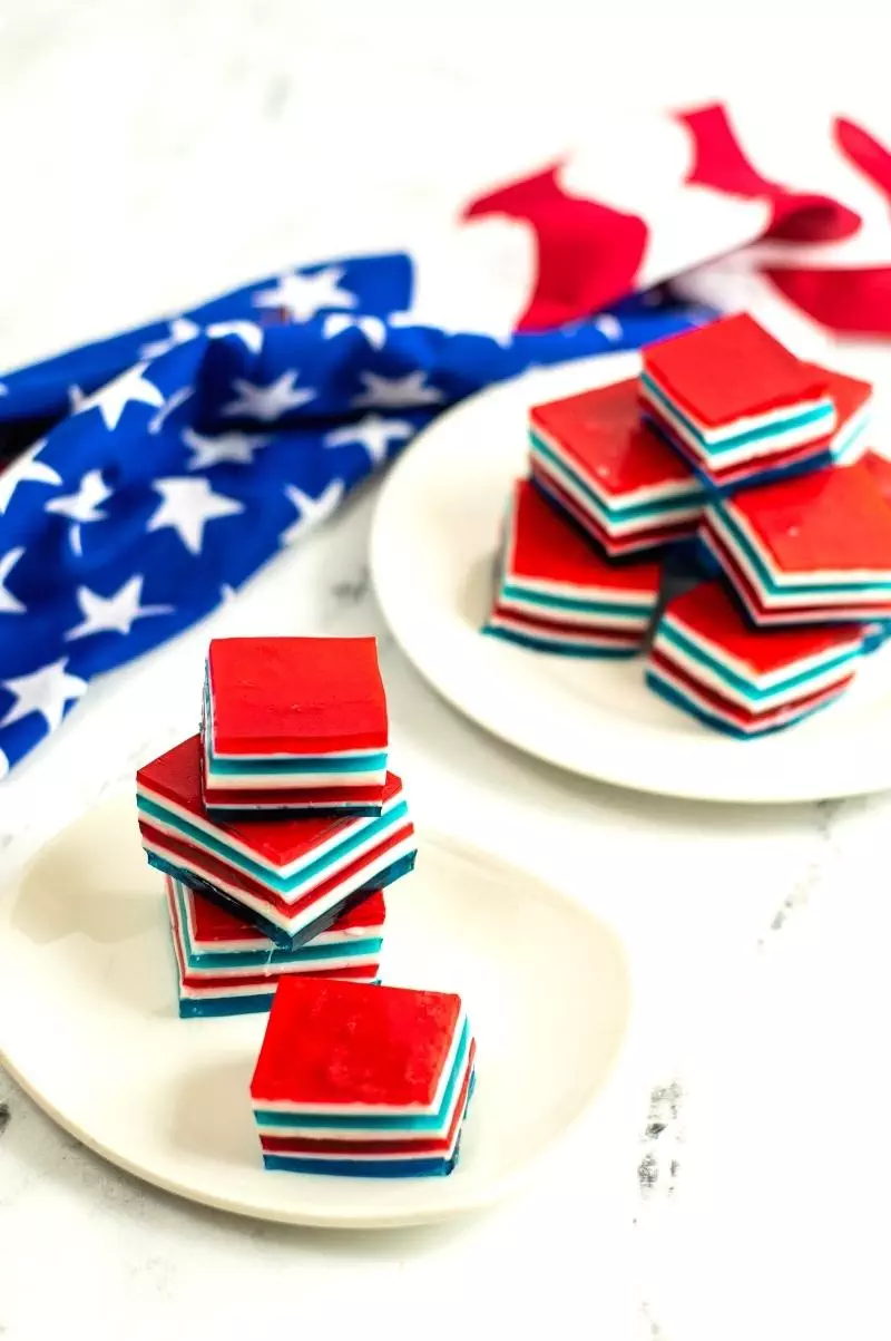 stacked red white and blue jello squares on plates