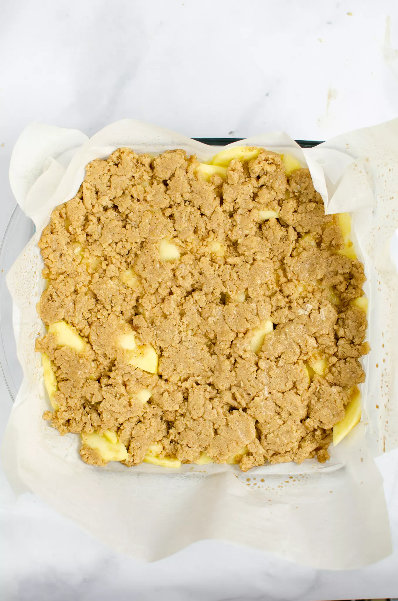 apple crumble topping added to bars