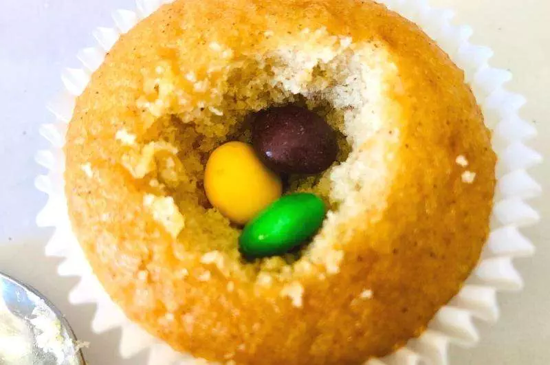 mardi gras king cupcake filled with candy