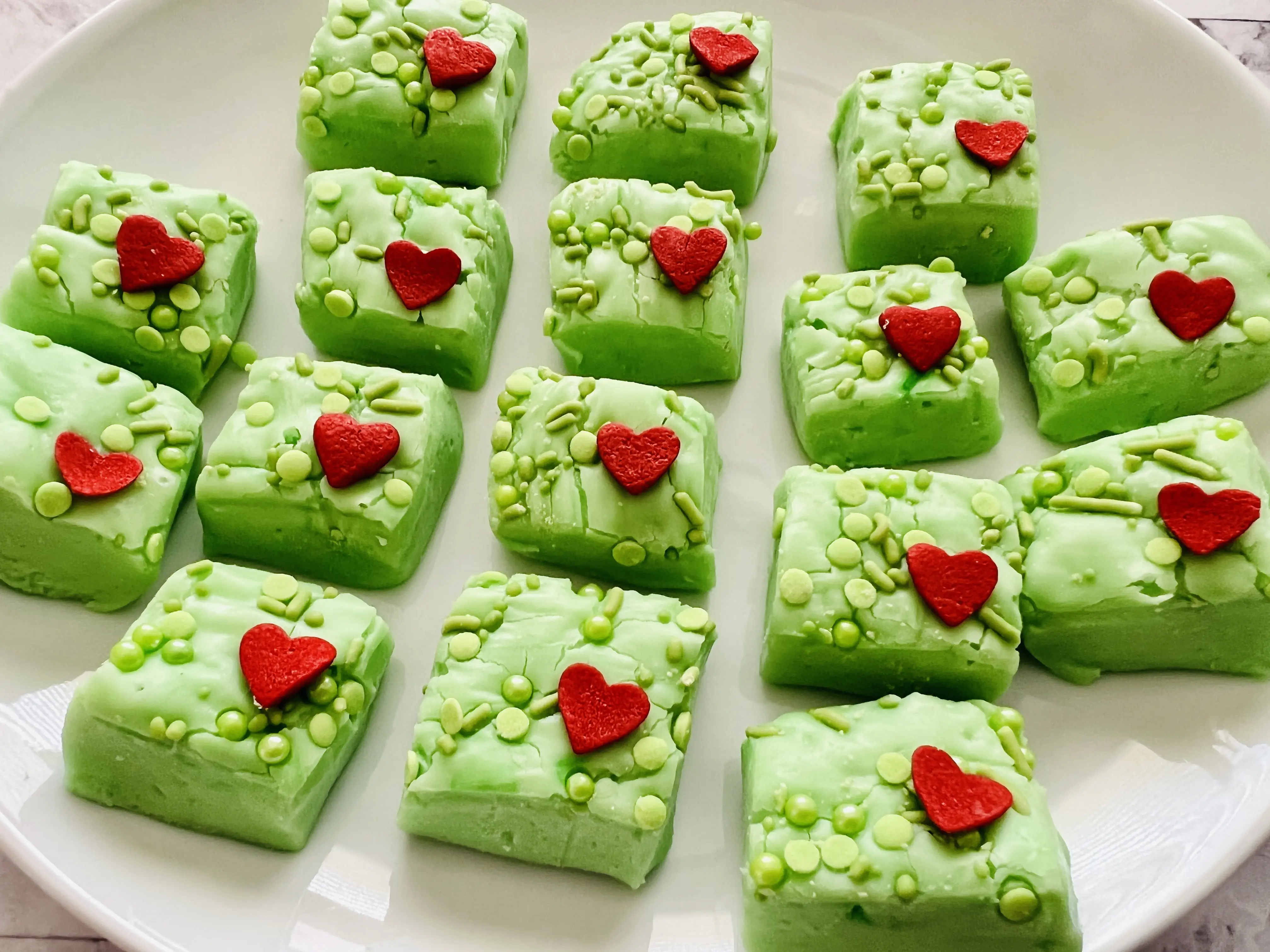 Grinch fudge pieces with hearts