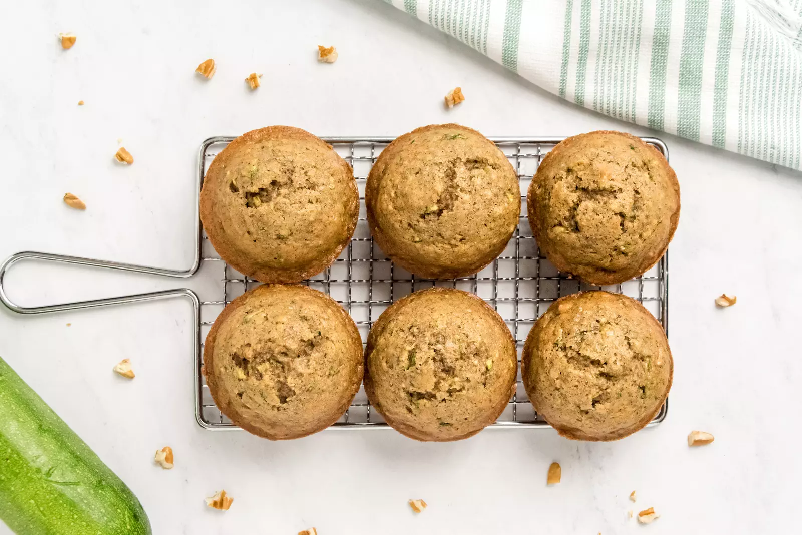 healthy zucchini muffins on a cooling rack