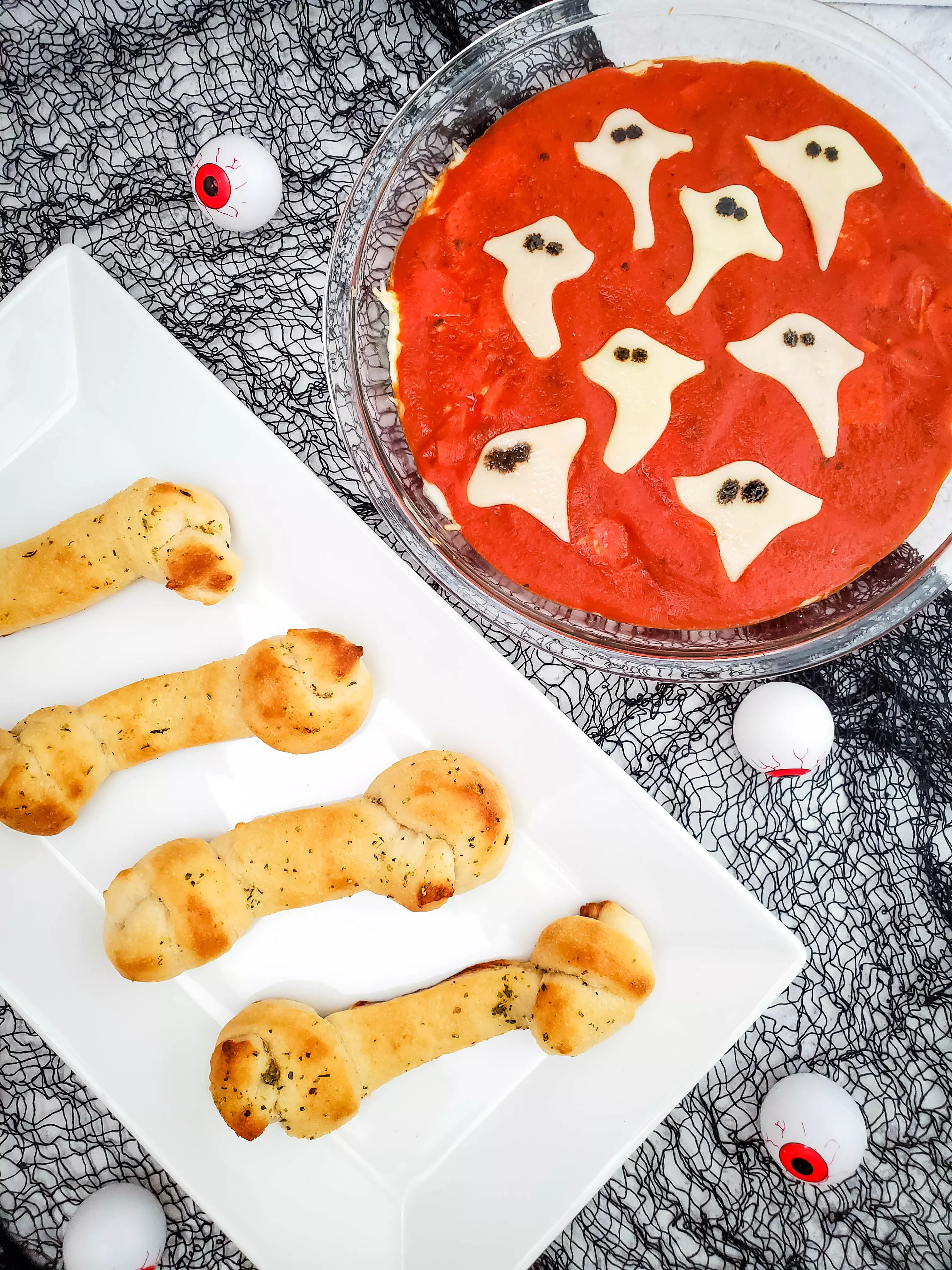 Halloween bone breadsticks with ghost dipping sauce