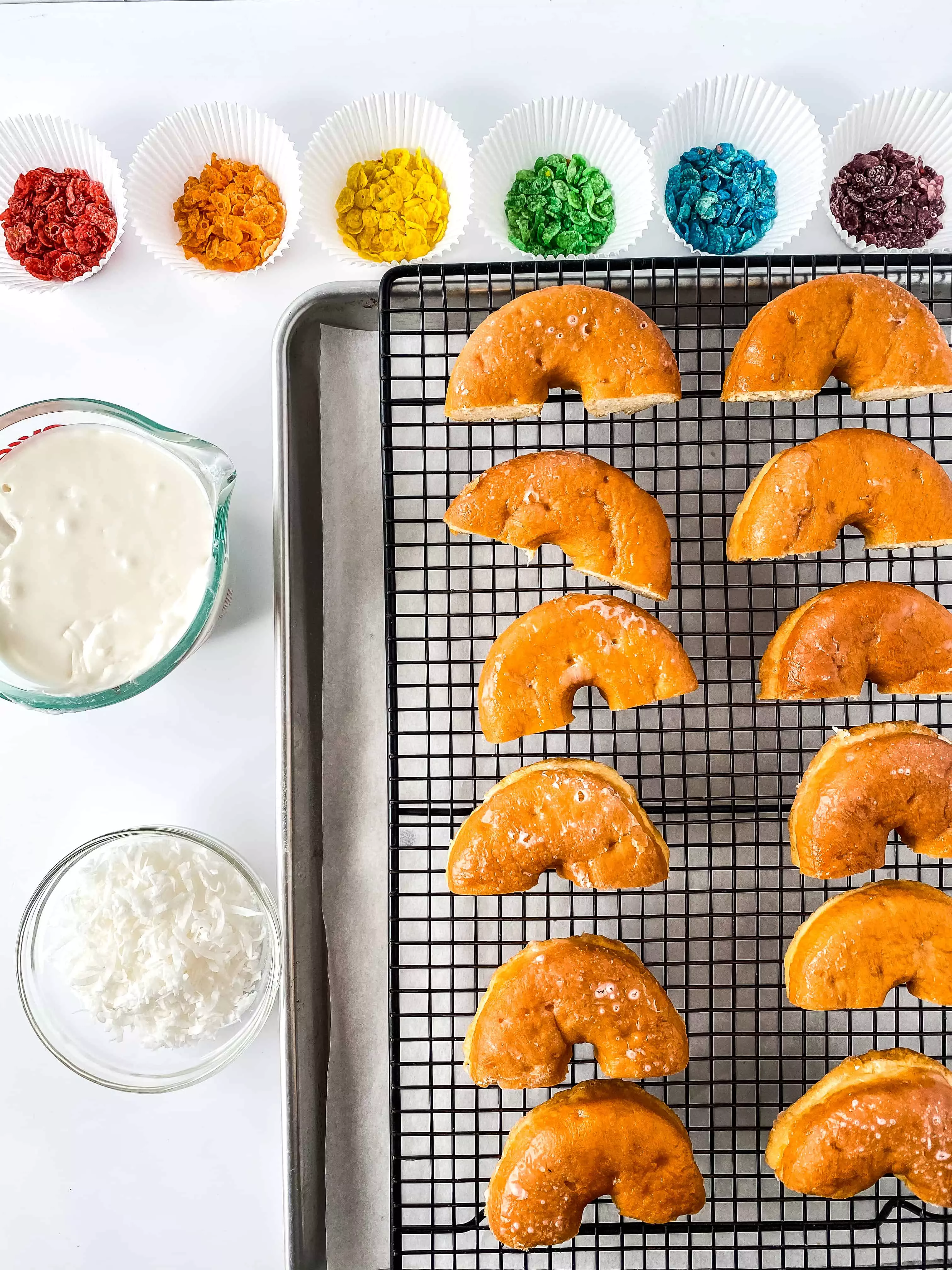 Ingredients for Rainbow Donuts! Make these fun donuts with fruity pebbles, white frosting, and coconut! They are SO easy to make that you