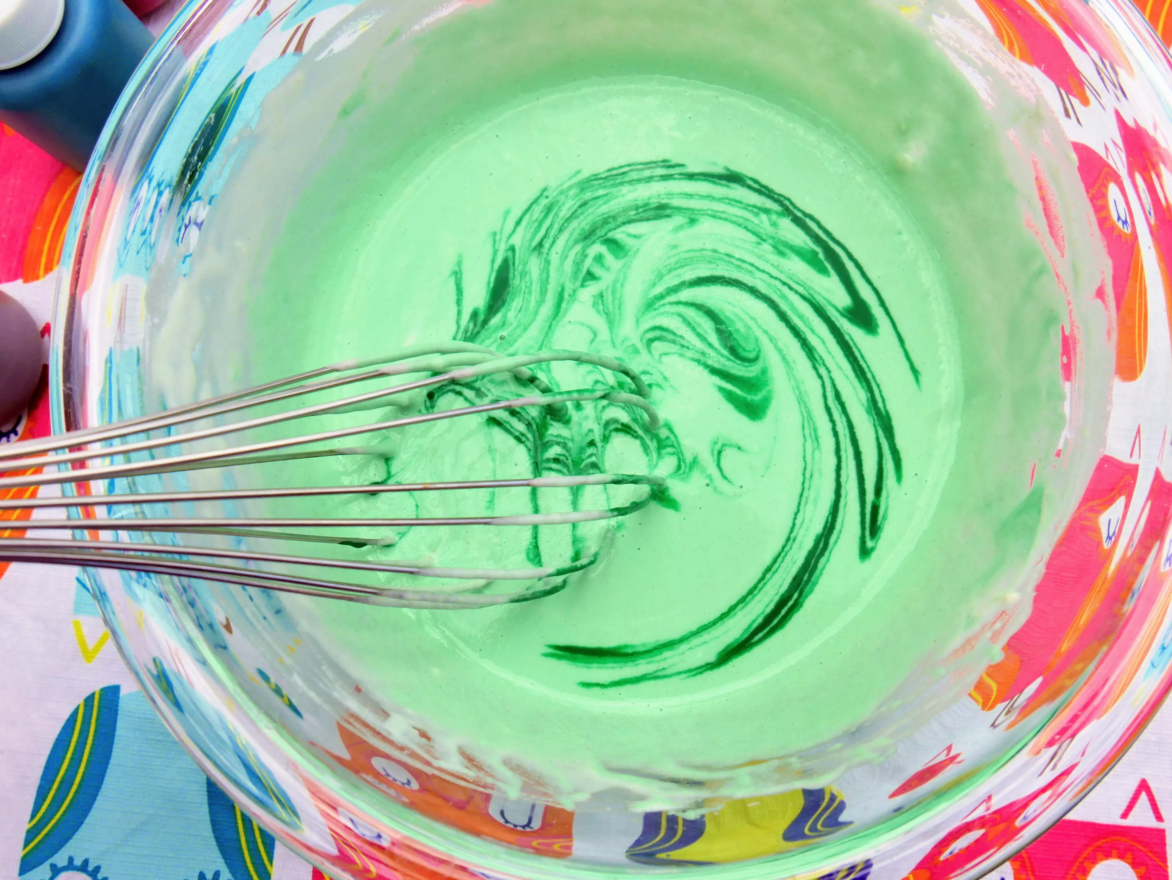adding food coloring to DIY outdoor puffy paint