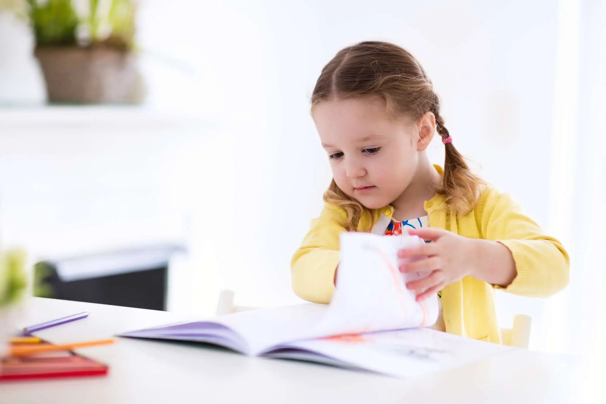 girl looking at a book