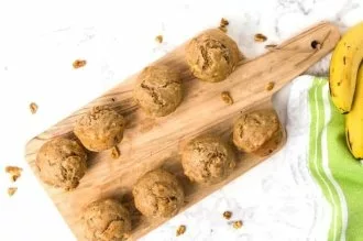 protein banana muffins on a wood board