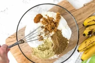 mixing dry ingredients for protein banana muffins