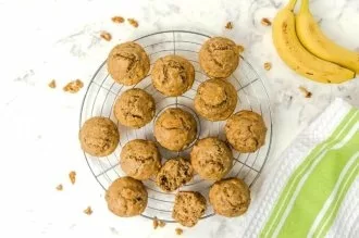 baked protein banana muffins on a cooling rack